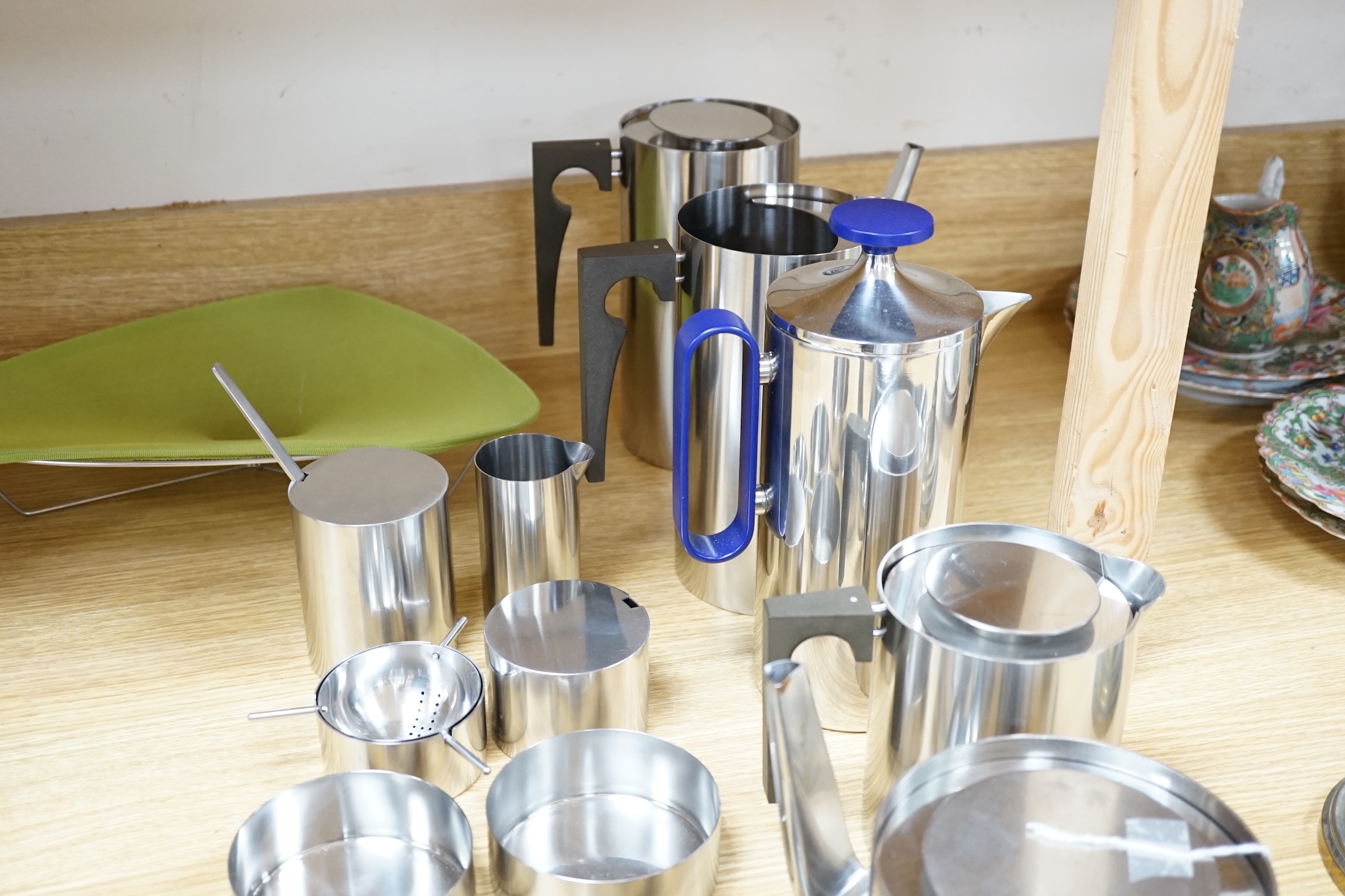 A thirteen piece suite of Arne Jacobsen stainless steel cylinder ware, coffee pot 24cm high